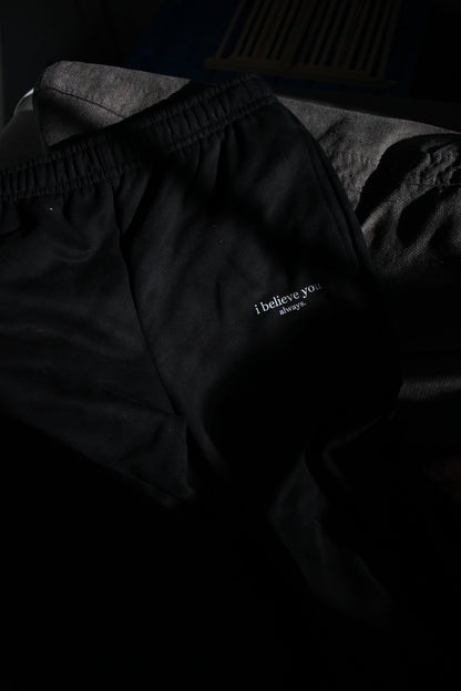 'i believe you always' sweats - black