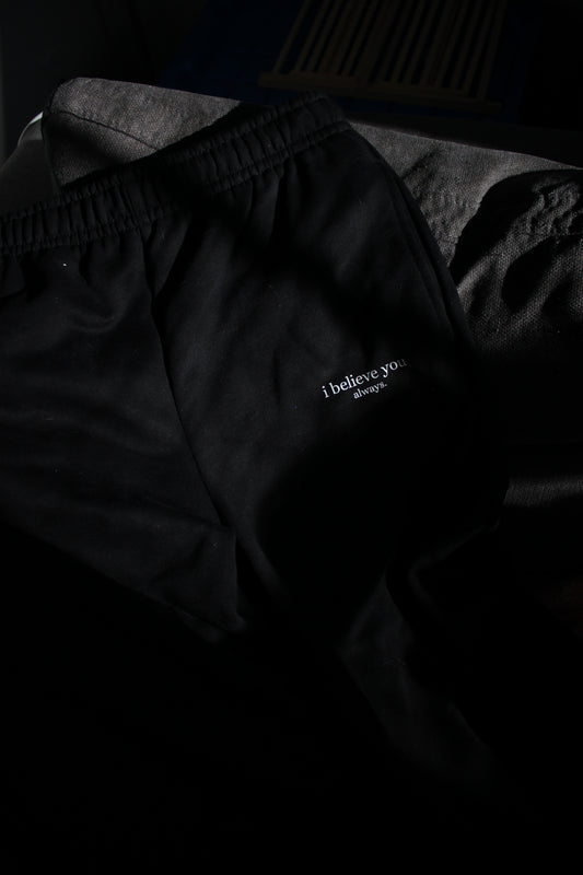 'i believe you always' sweats - black